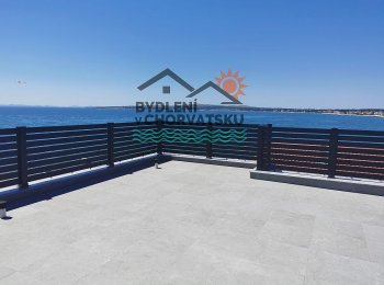 Byty s penthouse ve druhé řadě u moře